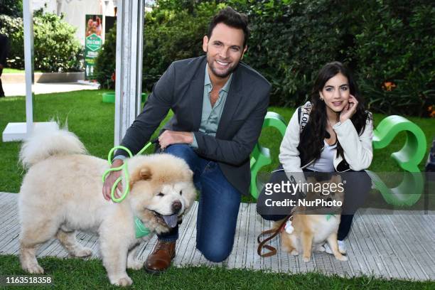 Actress Ela Velden and Actor Patricio Borghetti poses for photos during a press conference to launching of dog food 'Extra Life' of Dog Chow at...