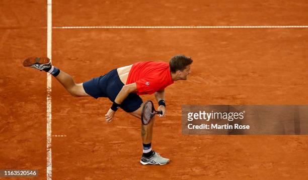 Martin Klizan of Slovakia in action against Daniel Altmaier of Germany on day one during the Hamburg Open 2019 at Rothenbaum on July 22, 2019 in...