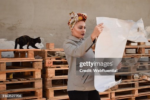 Woman working at a construction site Woman working at a construction site
