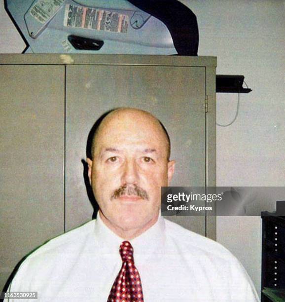In this handout, American police officer, consultant and convicted felon Bernard Kerik in a mug shot, New York City, US, June 2006.