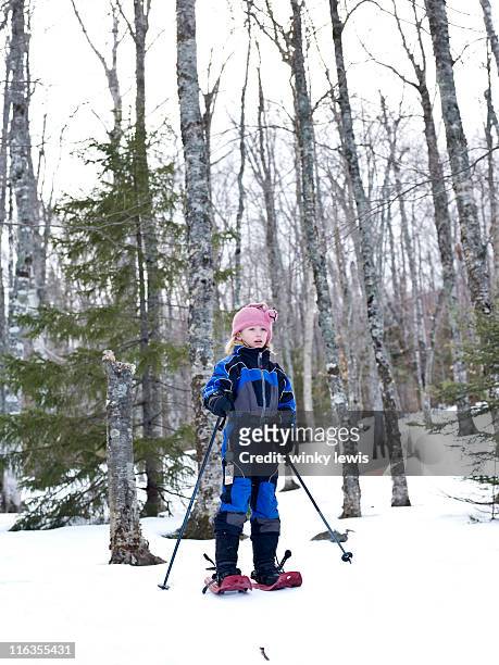 young girl snowshoeing - maine winter stock pictures, royalty-free photos & images