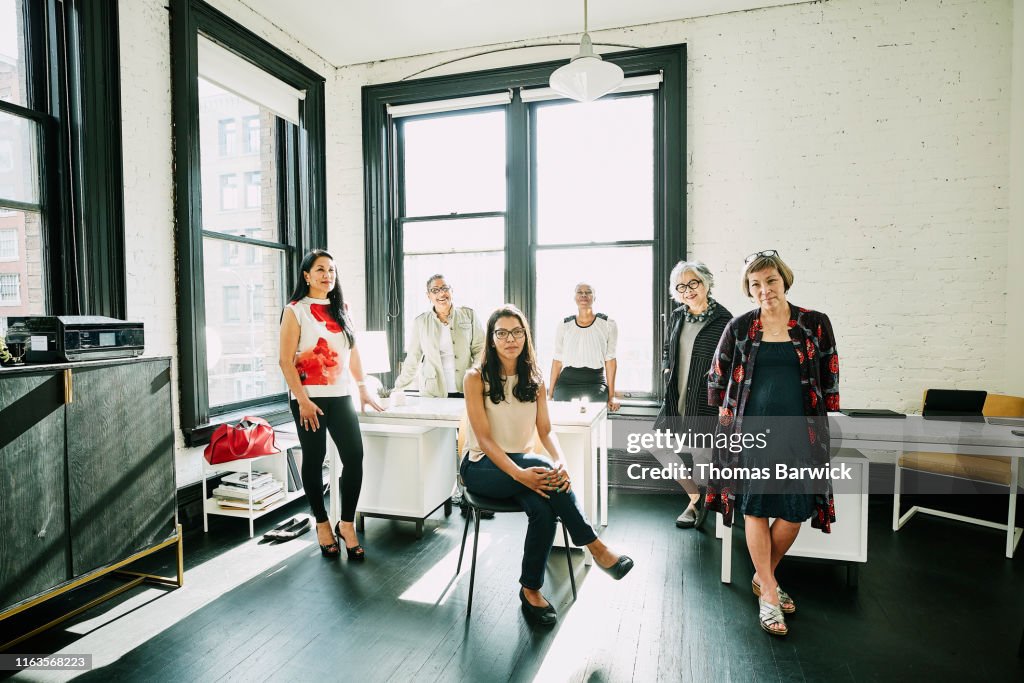 Group portrait of businesswomen in creative office