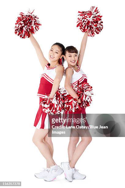 cheerleaders in action - asian cheerleaders ストックフォトと画像