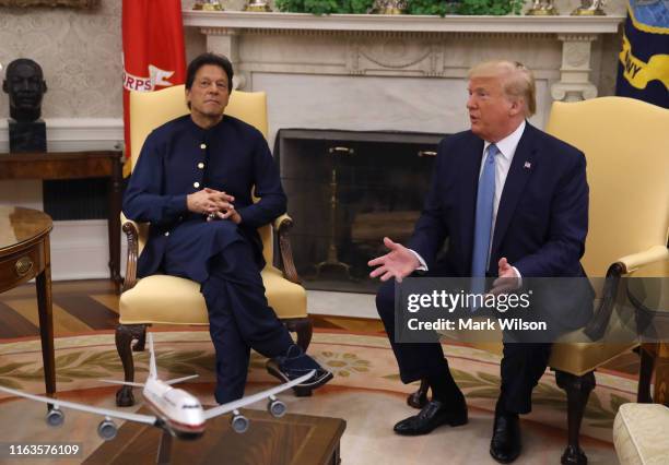 President Donald Trump speaks to the media during a meeting with Prime Minister of the Islamic Republic of Pakistan, Imran Khan in the Oval Office at...