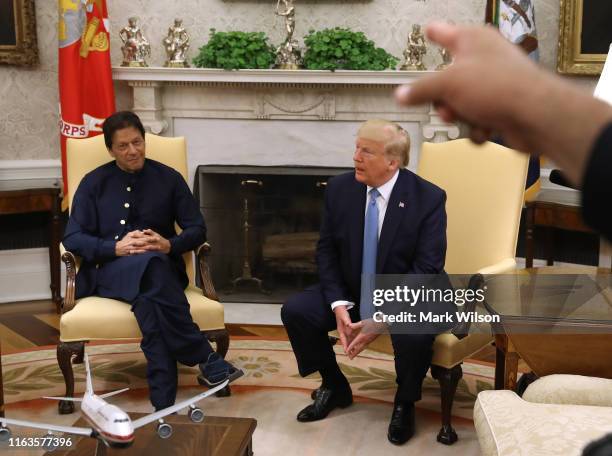 President Donald Trump and the Prime Minister of the Islamic Republic of Pakistan, Imran Khan, speak to the media in the Oval Office at the White...