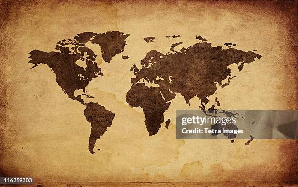 close up of antique world map - vintage world map stock pictures, royalty-free photos & images