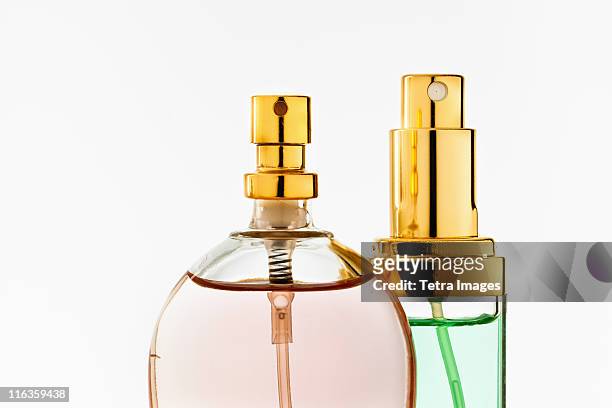 close up of perfume sprayers - perfume atomizer stock pictures, royalty-free photos & images