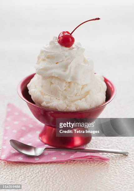 close up of ice cream with cherry on top - cherry on top stock-fotos und bilder