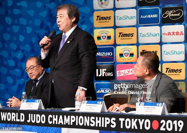 Olympic champion and President of The Kodokan, Haruki Uemura addresses the gathered judo coaches while alongside him are Soya Nakazato , left, and...