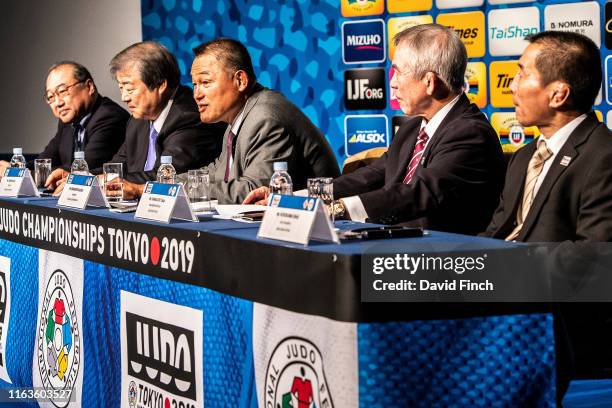 Olympic champion, Yasuhiro Yamashita, centre, speaks to the audience during the 2019 Tokyo World Judo Championships competition draw at the Tokyo...