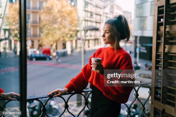 relaxed woman on the terrace - autumn coffee stock pictures, royalty-free photos & images