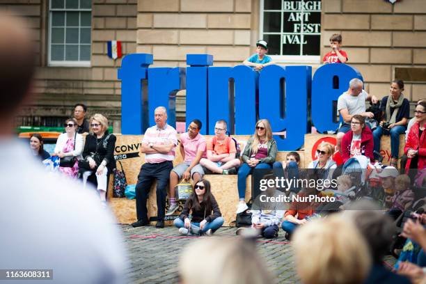 Entertainers perform on the Royal Mile during the Edinburgh Fringe Festival on August 24, 2019 in Edinburgh, Scotland. The Festival is the largest...