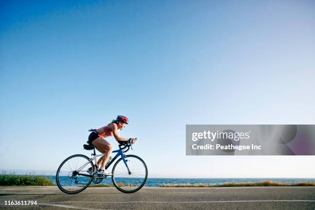 triathlon - triathlon cycling stock pictures, royalty-free photos & images