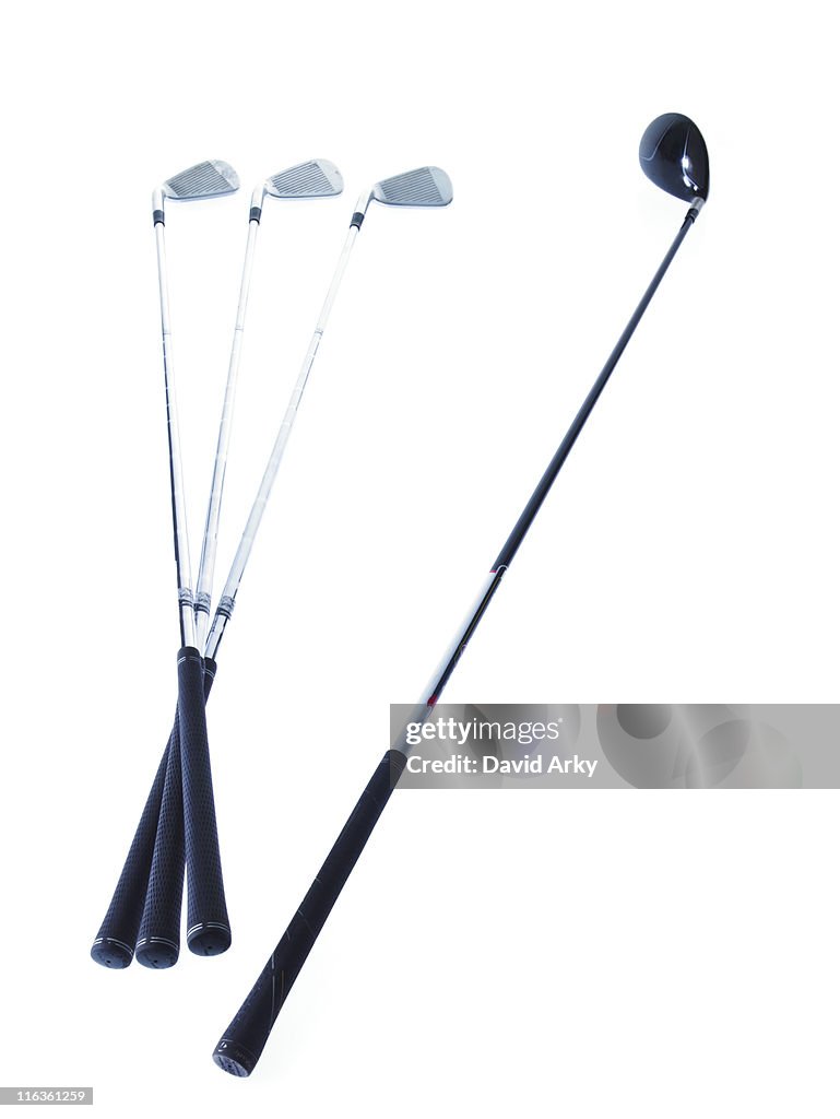 Golf clubs on white background