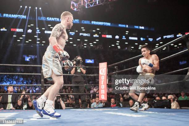 Bill Tompkins/Getty Images Carl Frampton defeats Leo Santa Cruz by Majority Decision during their Featherweight fight at the Barclay Center on July...