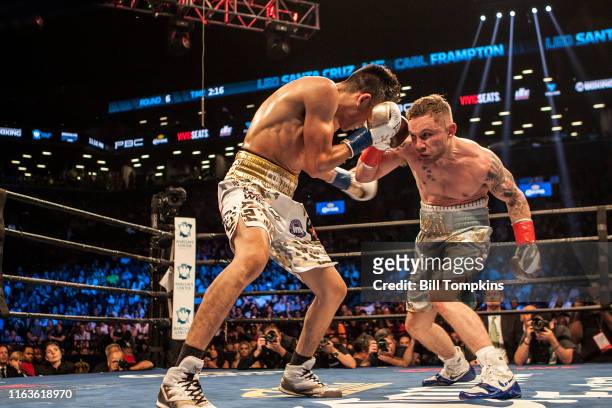 Bill Tompkins/Getty Images Carl Frampton defeats Leo Santa Cruz by Majority Decision during their Featherweight fight at the Barclay Center on July...