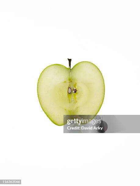 apple slice on white background - apple slice stock-fotos und bilder