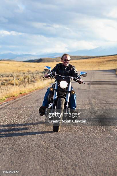 usa, colorado, carbondale, mature man driving motorcycle - carbondale colorado bildbanksfoton och bilder