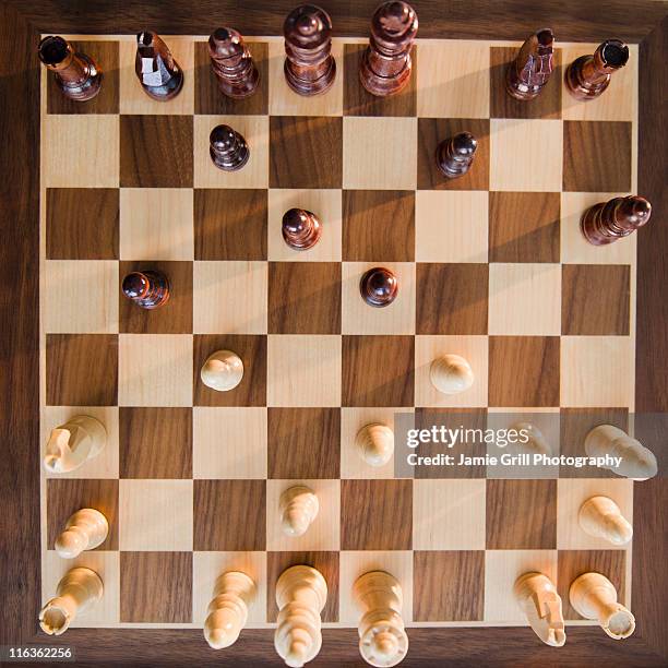 studio shot of chessboard - chess board overhead stock pictures, royalty-free photos & images