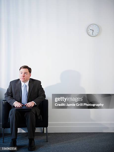 usa, jersey city, new jersey, businessman in waiting room - interview funny stock pictures, royalty-free photos & images