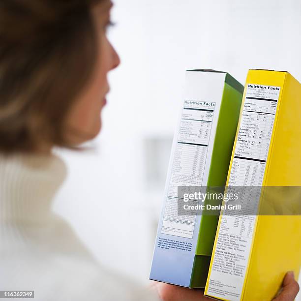 Comparing Labels 5,470 Food Package Labels Stock Photos, High-Res Pictures, and Images ...