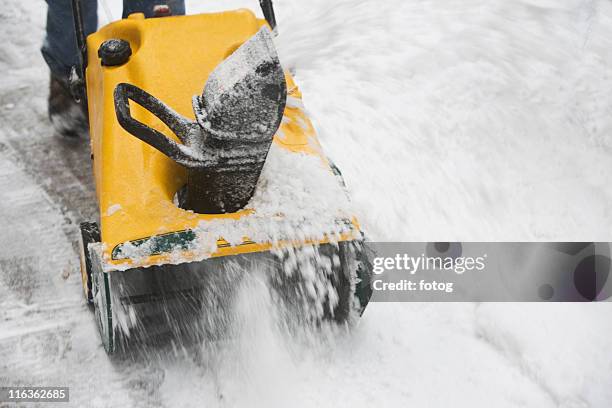 usa, new york city, machine removing snow - snow blower stock pictures, royalty-free photos & images