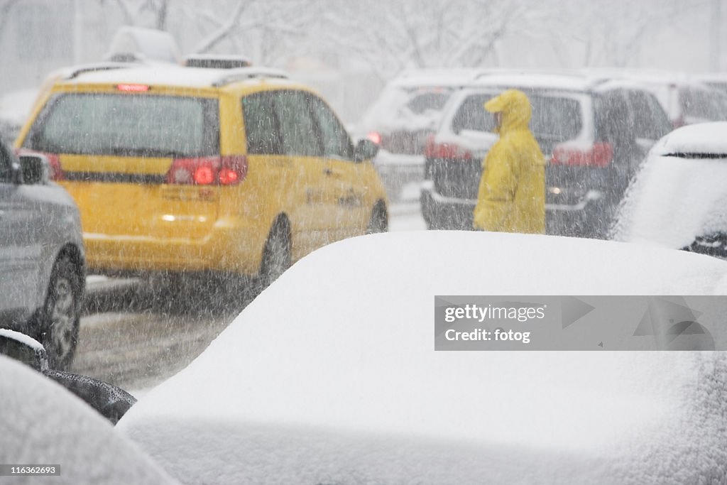 USA, New York City, city traffic in snowstorm