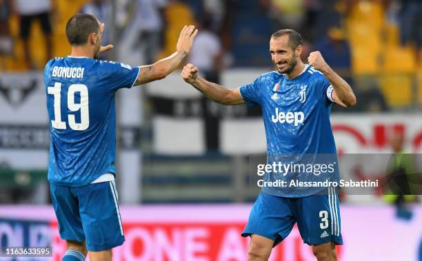 Giorgio Chiellini of Juventus celebrates the victory with Leonardo Bonucci of Juventus during the Serie A match between Parma Calcio and Juventus at...