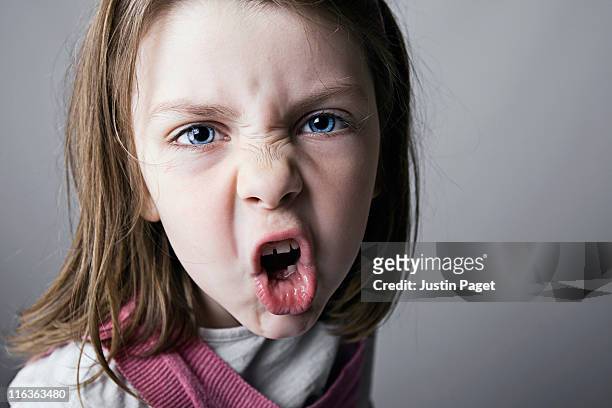 close-up of girl (6-7) shouting - child aggression stock pictures, royalty-free photos & images