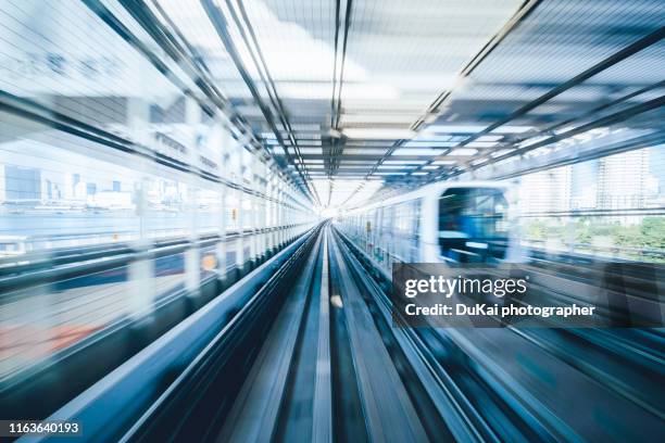 tokyo subway acceleration - long exposure train stock pictures, royalty-free photos & images