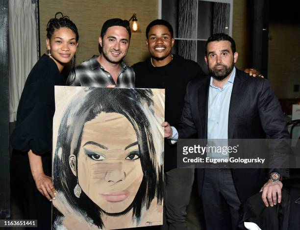 Chanel Iman, Jojo Anavim, Sterling Shepard and Seth Semilof attend the Haute Living And Louis XIII Celebrate Sterling Shepard at Brooklyn Chop House...