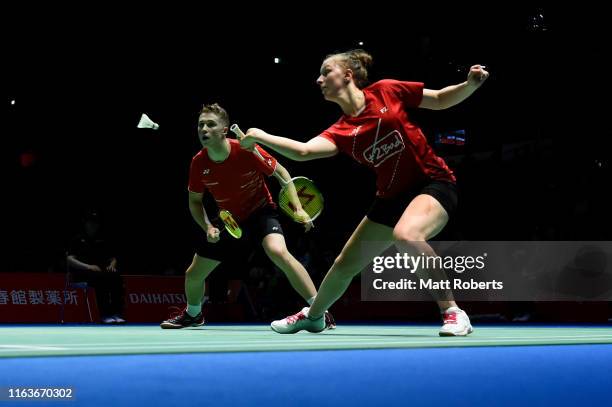 Thom Gicquel and Delphine Delrue of France compete against Tontowi Ahmad and Winny Oktavina of Indonesia during day one of the Daihatsu Yonex Japan...