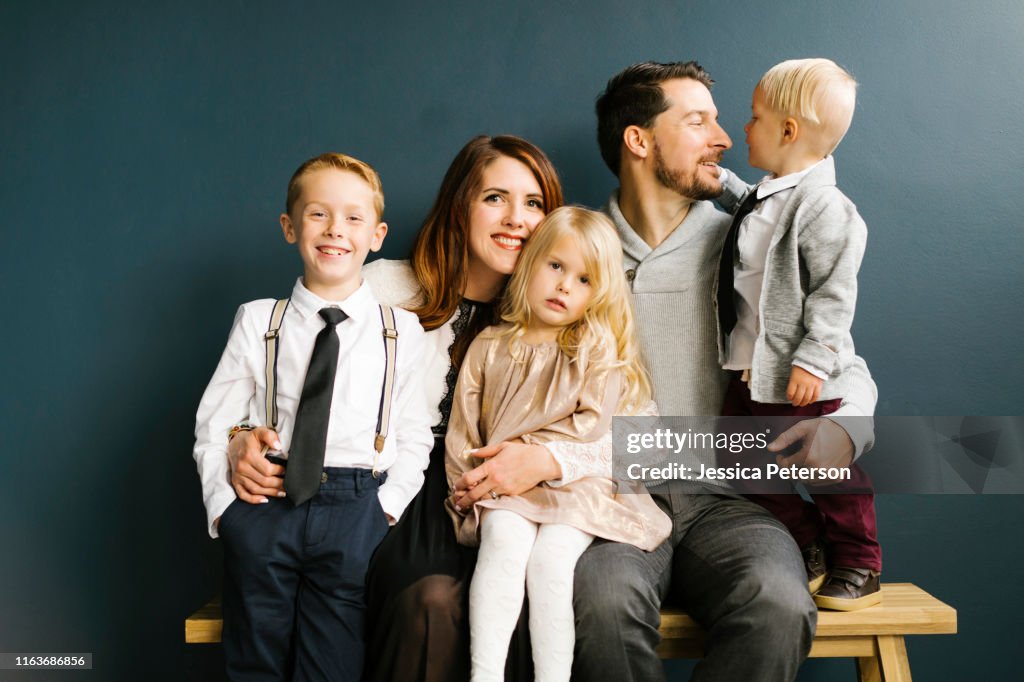 Family sitting on bench