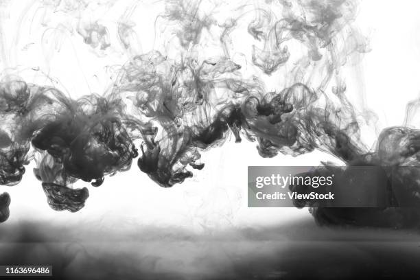 black ink dissolved in the water - lysis stock pictures, royalty-free photos & images