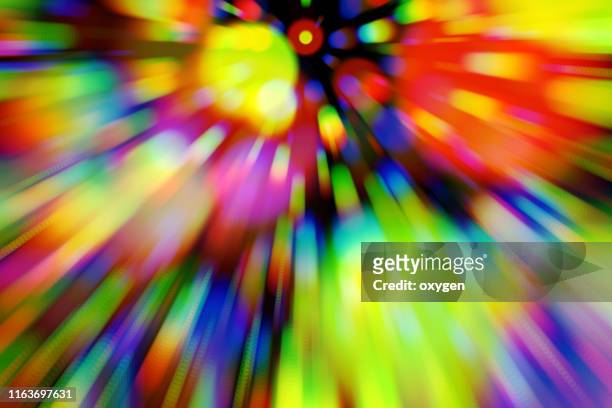 neon multicolored beams bokeh with black abstract blur background, motion light - light blur stock-fotos und bilder