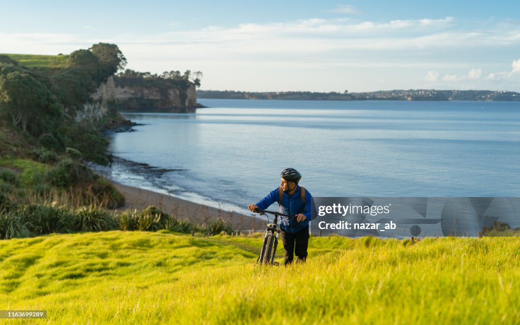 Bike rider climbing the hill.