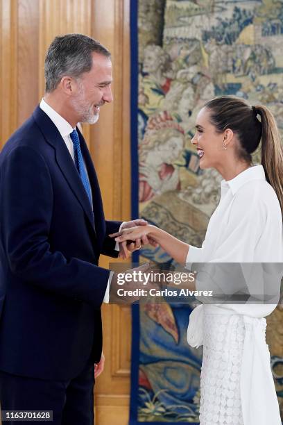 King Felipe VI of Spain receives Spanish synchronized swimmer Ona Carbonell at Zarzuela Palace on July 23, 2019 in Madrid, Spain.