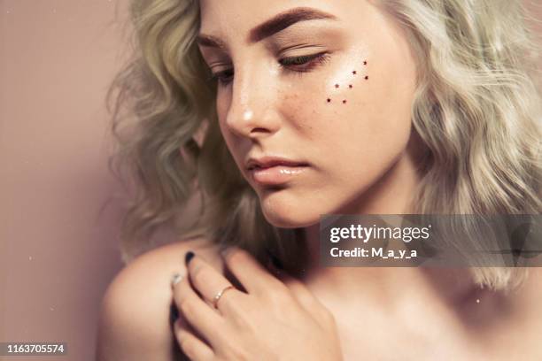 portrait of beautiful girl - glitter face stock pictures, royalty-free photos & images
