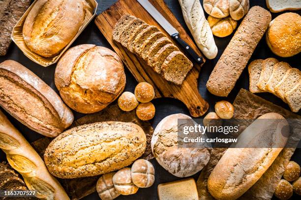 パンの品揃えの背景 - loaf of bread ストックフォトと画像