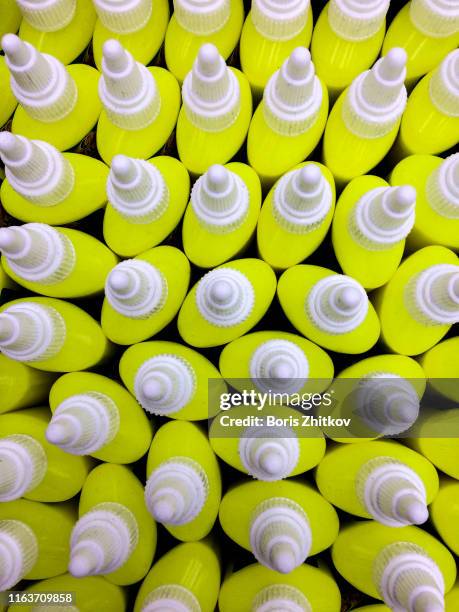 correction fluid bottles - shelf strip stock pictures, royalty-free photos & images