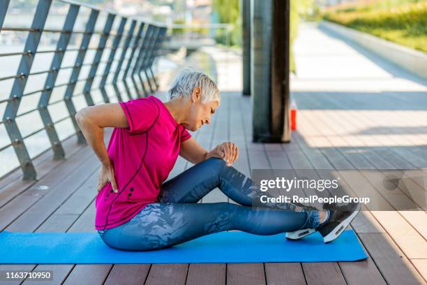 don't put too much pressure on your body - lower back stock pictures, royalty-free photos & images