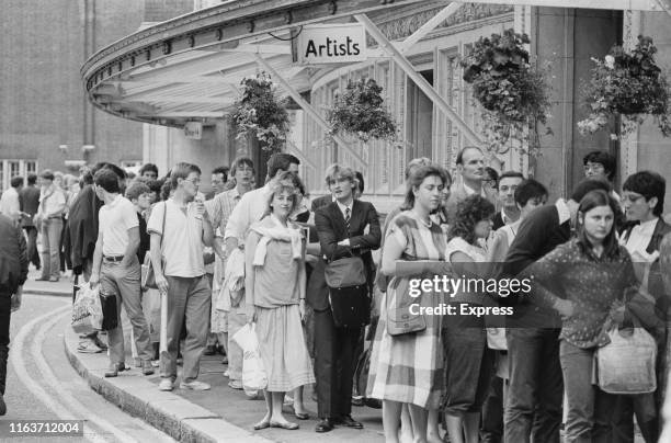 People queuing outside the Royal Albert Hall during The Proms season, London, UK, 7th August 1984.