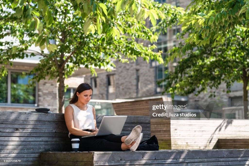 Freelance woman is working on the go