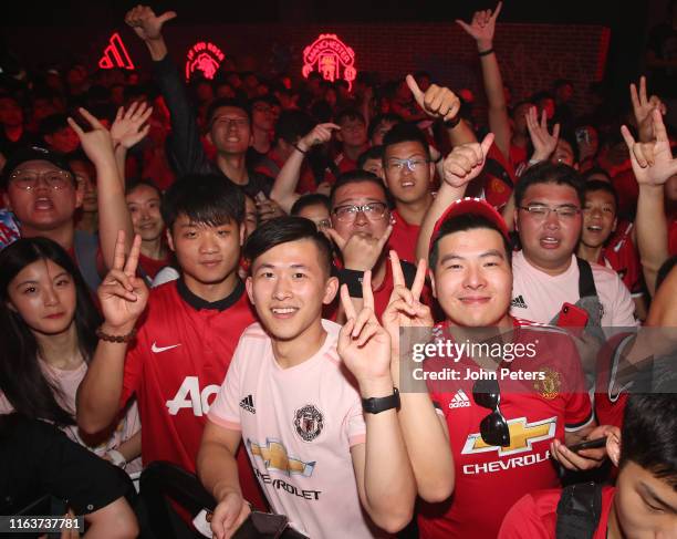 Manchester United fans attend the launch of the new Ultra Boost Rose Adidas trainer as part of their pre-season tour of Australia, Singapore and...
