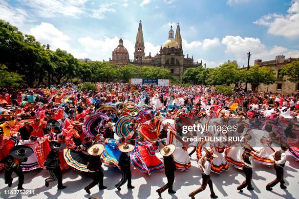 Couples dance to Mariachi traditional music to break the Guinness World Record of largest Mexican folk dance in Guadalajara, Jalisco state, Mexico,...