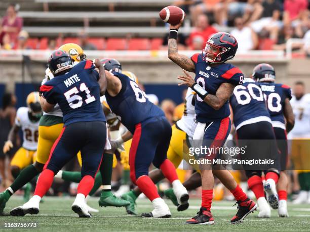 Vernon Adams Jr. #8 of the Montreal Alouettes passes the ball against the Edmonton Eskimos during the CFL game at Percival Molson Stadium on July 20,...