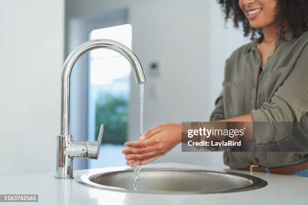 the simplest way to get rid of germs - running water faucet stock pictures, royalty-free photos & images