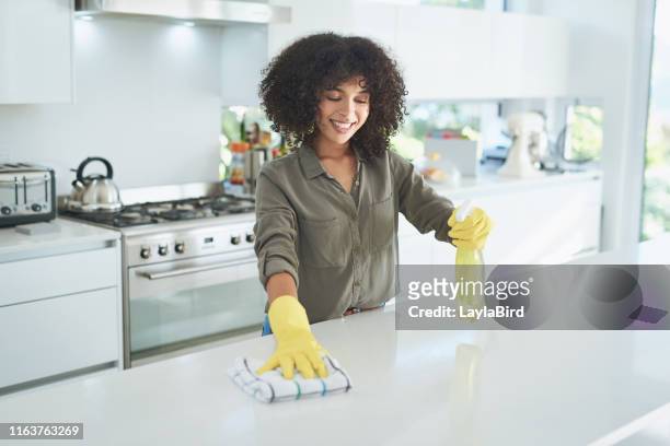 it's never too late to spring clean your home - black glove stock pictures, royalty-free photos & images