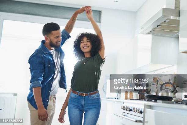 dance wherever you are - young couple dancing stock pictures, royalty-free photos & images