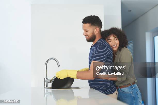 share the chores, share the love - husband cleaning stock pictures, royalty-free photos & images